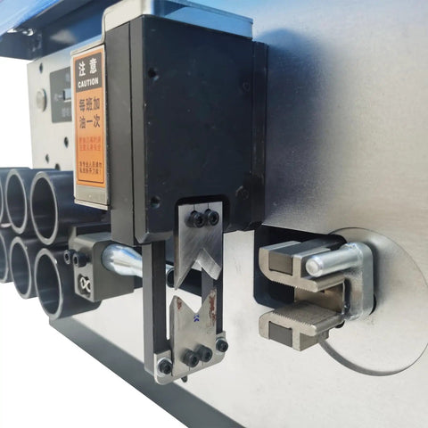 Close-up of Jaryannix Automatic Wire Stripping And Bending Machine 110V showing cutting blades and precision control features.