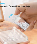 Hand pouring contents from 64 Jar Diamond Art Storage Kit With Clear Containers Portable Organizer And Label Sticker Set into tray.
