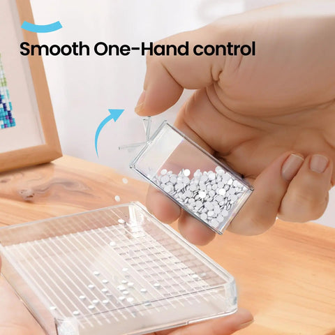 Hand pouring contents from 64 Jar Diamond Art Storage Kit With Clear Containers Portable Organizer And Label Sticker Set into tray.