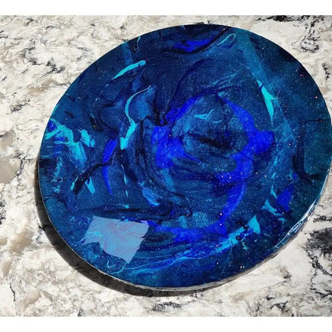 Ocean Resin And Wood Fifteen Inch Lazy Susan With Handcrafted Wave Pattern For Kitchens And Dining Tables on marble surface