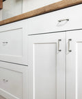 10 Pack Brushed Satin Nickel Cabinet Pulls With 3 Inch Hole Centers Solid Handles installed on white kitchen cabinets
