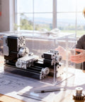 Zhrui Mini Metal Lathe Machine With 5 Pc Carbide Cutter Set, 20K Rpm Ultra Quiet Motor, All Metal Build, High Precision Turning For Wood Acrylic And Soft Metals Ready To Use Out The Box in a clear display box on a work table.