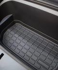 Tesla Model Y 2021 Refresh Frunk Liner Hecka Tough TPE Rubber Cargo Floor Mat custom fit in the frunk, showing texture and contours.