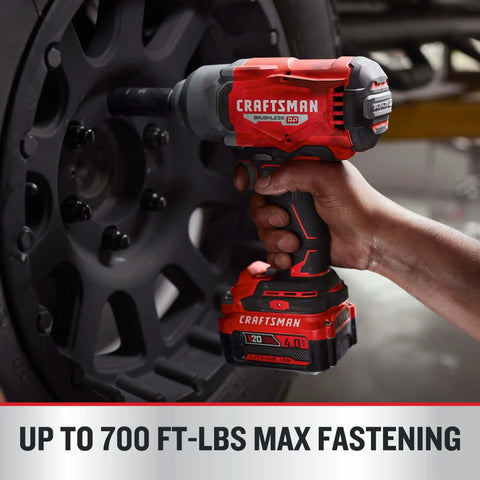 Cordless Brushless Impact Wrench Half Inch Beast Mode Power with 700 ft lbs Tightening in use on vehicle wheel