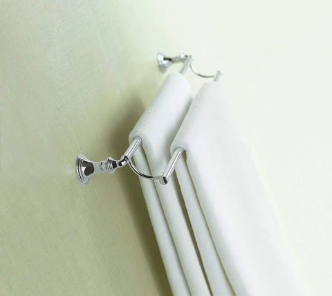 Devonshire 24 Inch Double Bathroom Towel Bar in Brushed Nickel Finish, mounted on wall with towels hanging, complements collection.