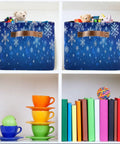 Dang Cool Canvas Storage Basket With Sparkly Winter Snowflake Pattern, filled with toys, displayed on a shelf.