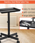 Height Adjustable Rolling Salon Tray on Wheels with Multi Level Height Range from 28 to 44 Inches in black, sturdy metal frame.