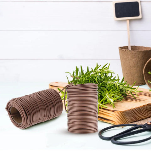 Soft Brown Plant Ties 130 Feet Garden Twists For Plants displayed on wooden surface with greenery and scissors