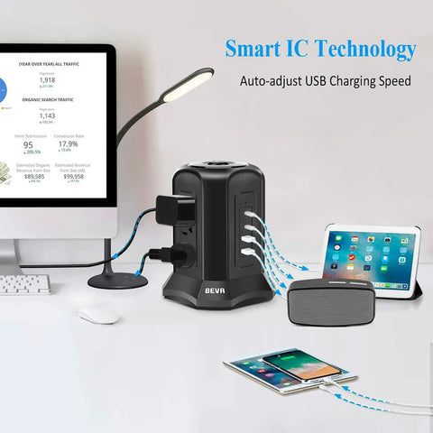 Power Strip Tower Surge Protector With Nine AC Outlets And Four USB Ports 900 Joules Long Ten Foot Flat Plug in desktop setup.