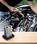 High Amperage Electric Vehicle Charging Connector Slick Fixed Base Heavy Duty Coupler Built Like A Tank For Easy Hook Ups with car engine background.