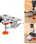 Front view of silver woodworking hinge boring jig with orange knob, for 35mm hinge holes.
