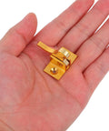 Brass Cabinet Door Latch With Spring Catch Old School Retro Style Window Security Lock in hand showcases size and golden color.