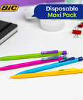 Colorful mechanical pencils with erasers, assorted barrel colors, on a table next to a notebook and office supplies.