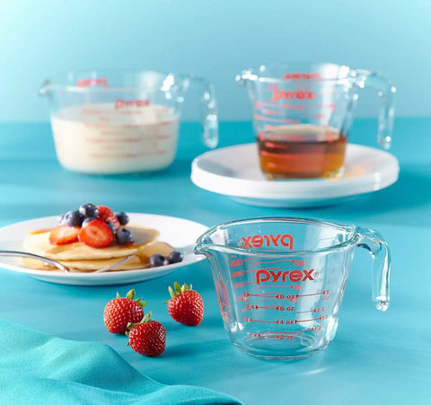 Three Piece Glass Measuring Cups Set With 1 Cup 2 Cup And 4 Cup Sizes For Prep Bake And Cook displayed with pancakes and syrup