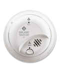 Hardwired Smoke And Carbon Monoxide Combo Detector With Adapter Plugs For No Sweat Swap Install And Ten Year Battery Backup, top view.