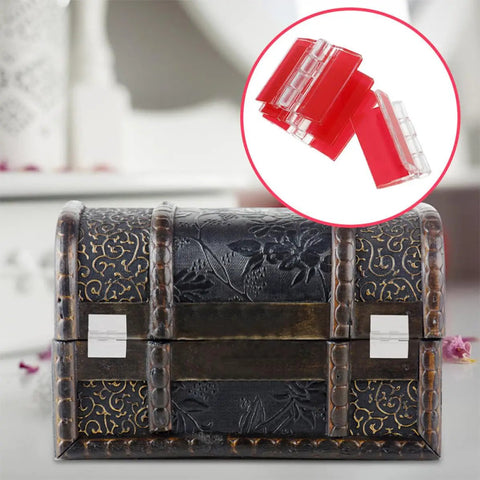 Decorative box with red Six Pack SelfAdhesive Acrylic Cabinet Hinges Foldable 35x25mm for multi-surface bonding shown.