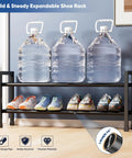 Two Tier Expandable Shoe Rack That Grows From 17 To 33 Inches, Heavy Duty Metal Shoes Organizer holding water bottles and shoes