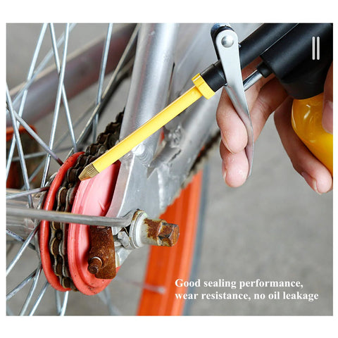 HUAXIU metal oil can oiler, 8oz, side view, 9in flexible and 3in straight spouts, yellow for bicycle chain.