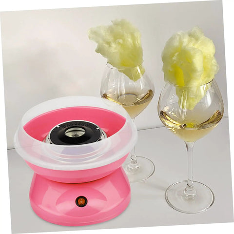 Pink cotton candy machine with cotton candy on wine glasses, featuring Cotton Candy Machine Guard Cover For Sugar Floss Makers Lightweight And Reusable Enclosure Easy To Clean Indoor Use Mess Free Protection That Keeps Little Fingers Safe And Your Countertop Clean.