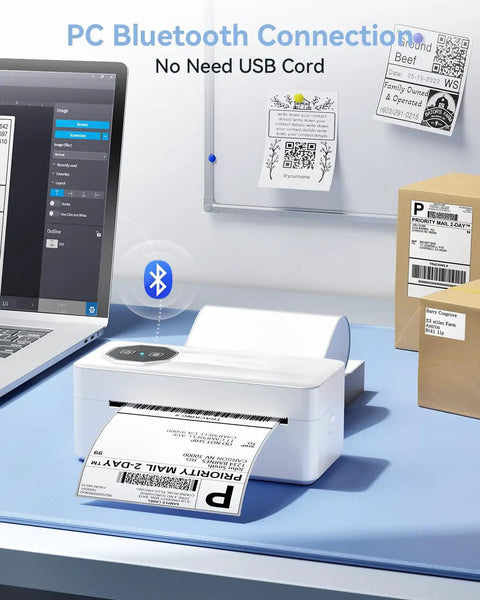 Bluetooth Thermal Label Printer For Small Biz 4x6 Wireless Label Printer With 72 Labels Per Minute Compatible With iPhone Android Windows Mac USPS Amazon UPS White on desk with labels and laptop