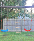 Beefy Heavy Duty Swing Spring Hardware Kit installed on outdoor swingset with blue and red seats, showing suspension for swing seats