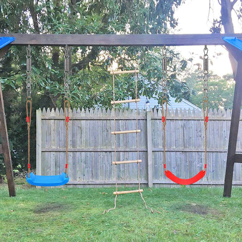 Beefy Heavy Duty Swing Spring Hardware Kit installed on outdoor swingset with blue and red seats, showing suspension for swing seats