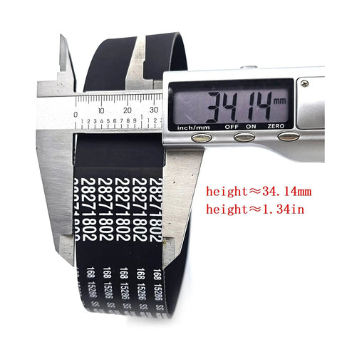 Digital caliper measuring black rubber belt with white text, showing dimensions of 34.14 mm and 1.34 inches in height.