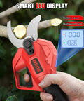Upgraded Electric Pruning Shears With 2.56 Inch Cutting Capacity cordless pruner in use showing LED display on tree branch