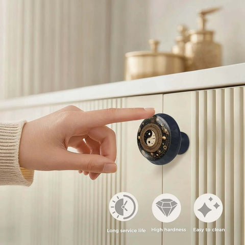 Hand touching Four Pack Yin Yang Feng Shui Cabinet Knobs Set Round Acrylic Drawer Pulls on kitchen cabinet