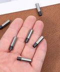 1/4 To 1/8 Collet Adapter Set For CNC Routers And Engraving Machines in hand on brown background