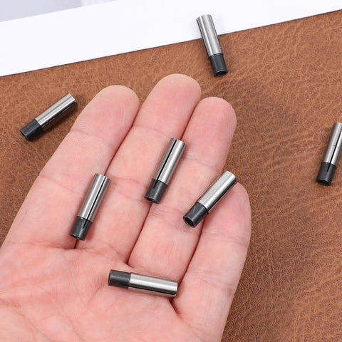 1/4 To 1/8 Collet Adapter Set For CNC Routers And Engraving Machines in hand on brown background