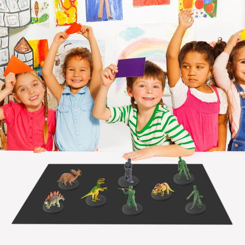 Children playing with figures on Flexible Iron-Particle Vinyl Magnetic Receptive Sheet 11 By 17 Inches Four Pack With Adhesive Backing.