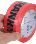Heavy Duty Packing Tape 7 Roll Pack 100 Foot Each Sticks Like Crazy Strong Adhesion Carton Sealing Tape For Moving And Shipping Durable Plastic Material Ideal For Boxes And Shipping Supplies, pink roll held by hand