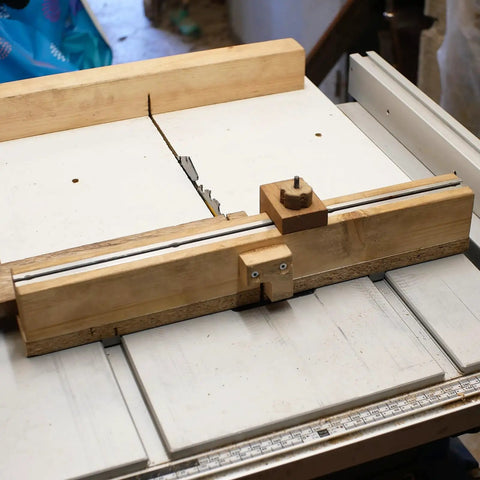 Aluminum T Track 1.2 Inch M8 Slot Slider For Router Table And Miter Saw Fixtures, Double Cut Pre Drilled Mount Holes, 4 Pack Silver T Slot Rail For Woodworking And Crosscut Sled Pro Grade Heavy Duty Easy Mount installed on a table saw crosscut sled