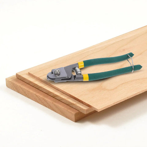 Pro Multi-Functional Cable Stripping Pliers With Ergonomic Handle For Precise Wire Gauge Adjustment on wooden surface.