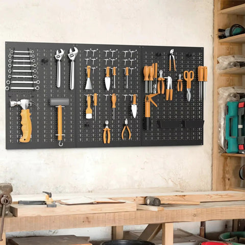 Heavy Duty Metal Pegboard Panels 3 Pack For Garage Wall Organization And Tool Storage, Modular Peg Board Organizer For Workbench, Powder Coated Steel Panels In Black installed in workshop with tools.