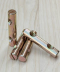 Barrel Nut Dowel Cross Dual Hole Nuts Pack Of 5 for wood assembly, carbon steel with colorful zinc finish on wooden surface
