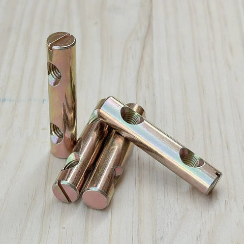 Barrel Nut Dowel Cross Dual Hole Nuts Pack Of 5 for wood assembly, carbon steel with colorful zinc finish on wooden surface