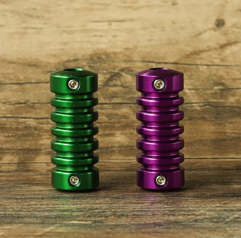 Green and purple grips from Four Coil Tattoo Machine Kit Set For Lining Shading And Coloring With Power Supply Foot Pedal Cartridges