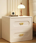 Heavy Duty Butterfly Cabinet Knobs With Slick Brushed Gold Finish For Dressers crafted from solid brass on a wooden nightstand.