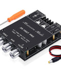 2 Channel Bluetooth Five Zero HiFi Amplifier Board With 100W And 100W Output Subwoofer Ready USB And AUX Inputs Bass And Treble Control DC 12 To 24V DIY Speaker Amp Module For Speaker Rigs, with treble and bass knobs, screwdriver, and power cable.