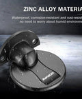 Heavy Duty Magnetic Floor Door Stopper That Keeps Your Door Locked In Place With Premium Peel And Stick Tape No Drilling Headache For House Or Work Space Black on a wet surface showing zinc alloy material.