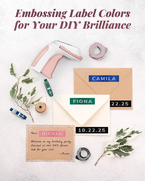 Vintage Embossing Label Maker With Six Adhesive Tape Rolls Manual Typewriter Style Sticker Gun on a flat lay with colored labels.
