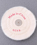 Top view of a white cloth polishing wheel with 'Made in China' text, part of Two Pack 6 Inch White Cloth Polishing Buffing Wheels For Jewelry And Stainless Steel Heavy Duty Abrasive Grinding Wheels With Stock Removal Deburring And Finishing Capabilities