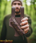 Medieval Leather Sword Frog Holster For Dagger Rapier And Sabre Props held outdoors close-up with lacing detail