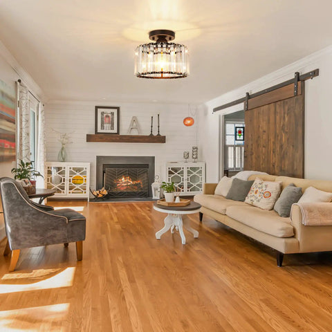 Living room decor featuring Semi Flush Mount Crystal Ceiling Light Fixture With Black Metal Cage, Farmhouse Chandelier Vibe above seating area.