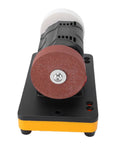Pissente Three Inch Mini Bench Grinder With Cordless Design For Ultimate Portability Uses 20 Volt Lithium Battery compatible with Dcb230, showcasing grinding wheel.