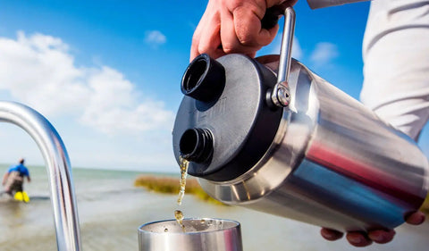 Pouring drink from Rambler Gallon Water Jug With Vacuum Insulated Stainless Steel No Sweat Design MagCap Magnetic Lid