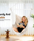 Heavy Duty Hammock Chair With Steel Spreader Bar And Adjustable Straps For Indoor Outdoor Use Up To 500 Lbs shown indoors