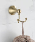 Brushed Gold 4 Piece Bathroom Hardware Set towel hook in use, stainless steel anti rust and corrosion resistant for bath upgrade.